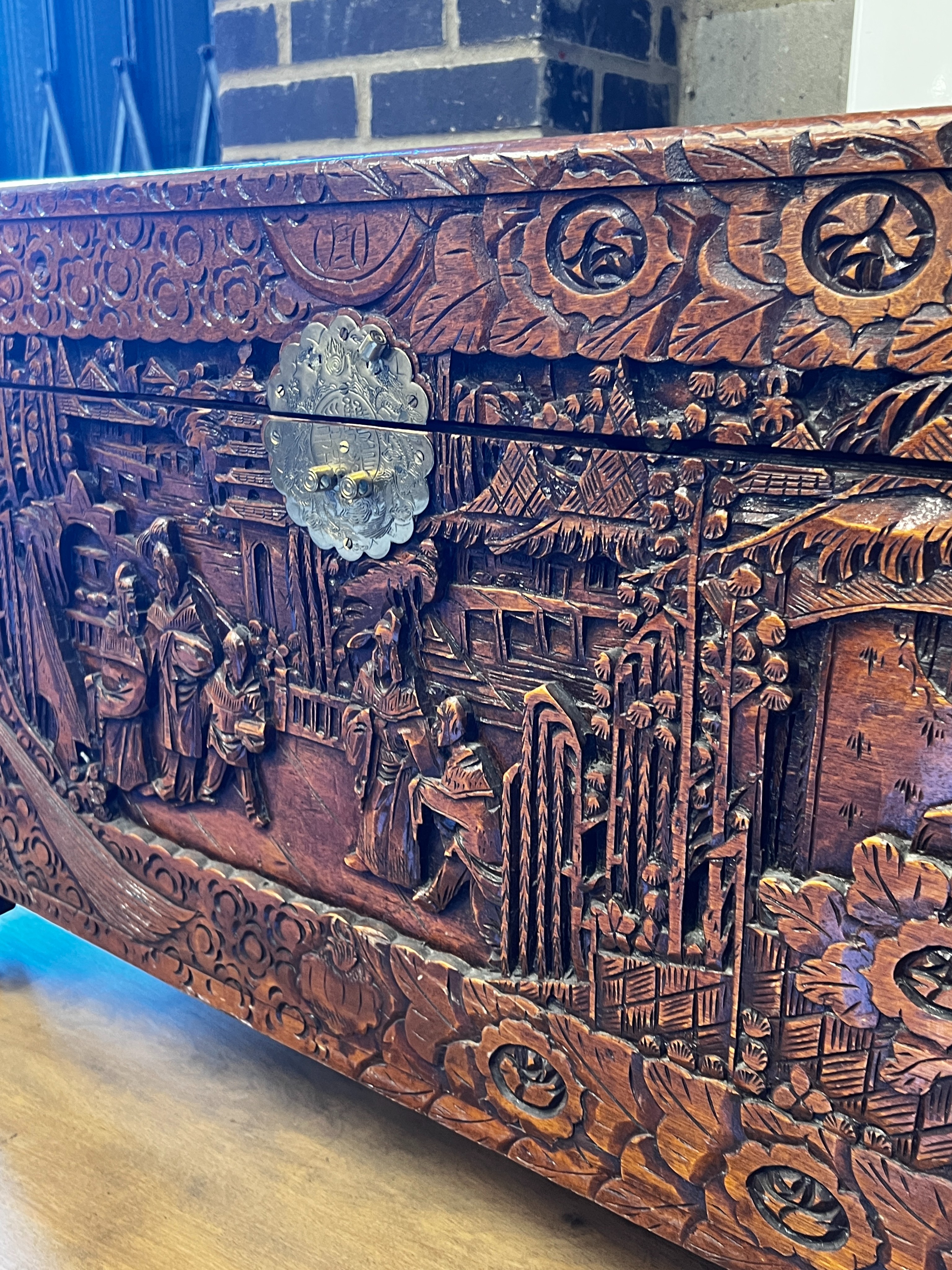 A Chinese carved camphorwood trunk, length 100cm, depth 50cm, height 60cm